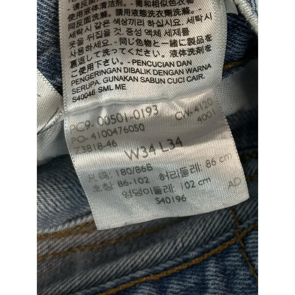 VTG Levis 501 Jeans Mens 34x34 Light Wash Blue Regular Straight Distressed Denim